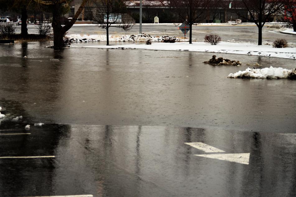 Parking lot underwater at W. Nye and N. Carson St.