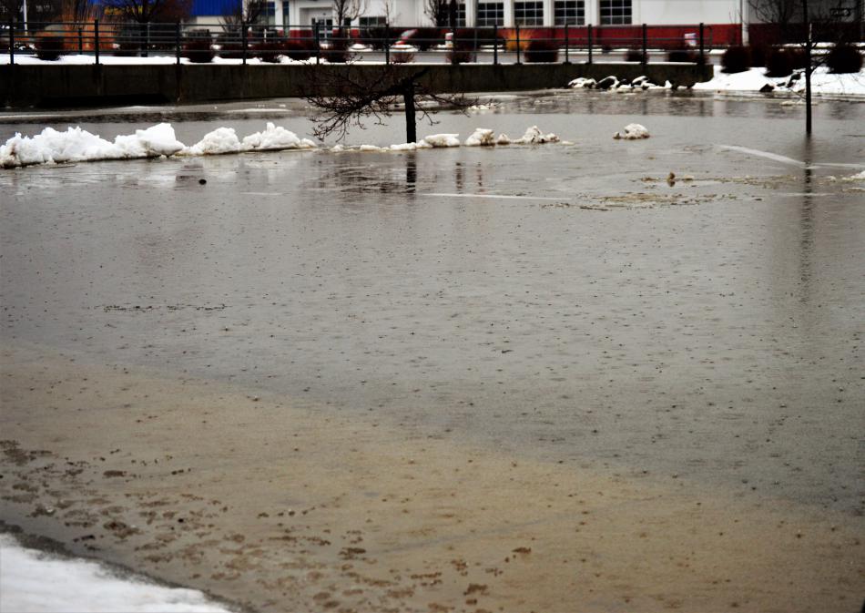Parking lot underwater at W. Nye and N. Carson St.