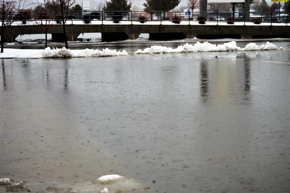 Parking lot underwater at W. Nye and N. Carson St.