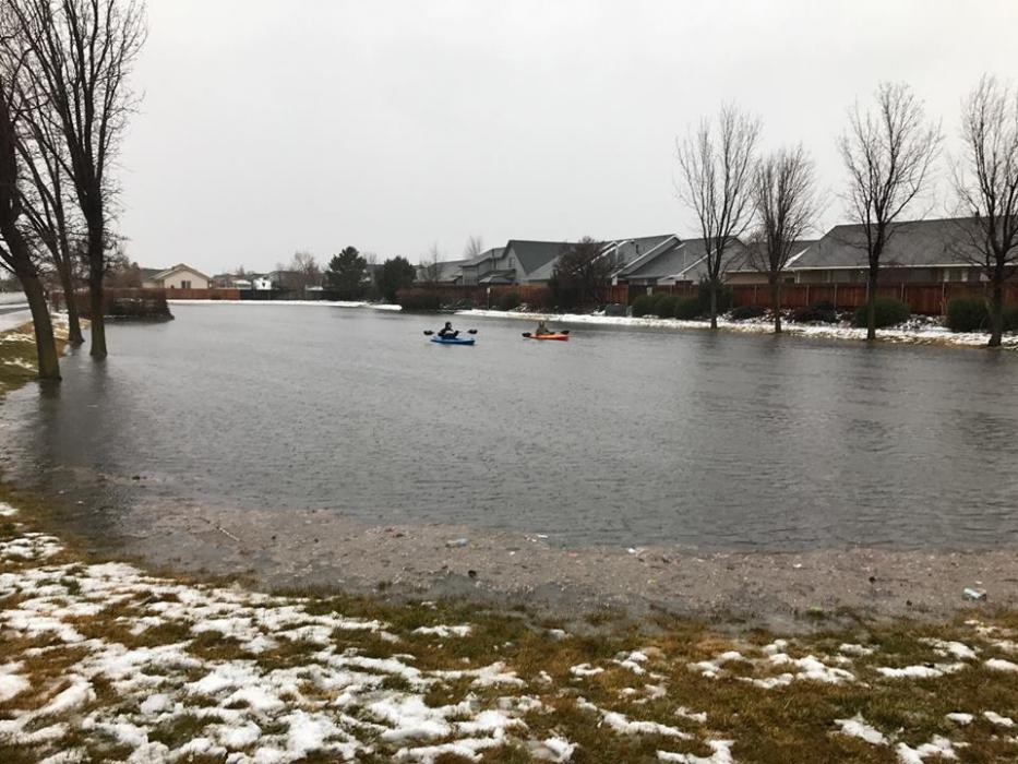 Kayakers take to the street near Koontz. Photo by Marissa Rose Torres