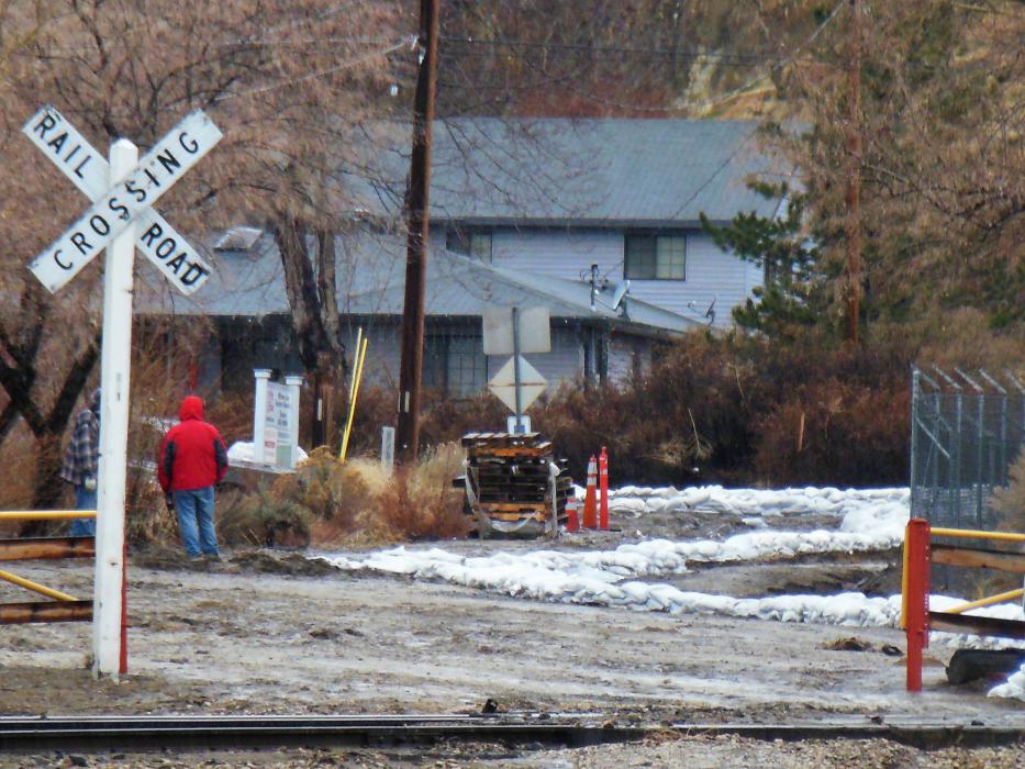 Sandbags create a dike to divert water from Rhodes and Curry to the culvert on NSRM property.