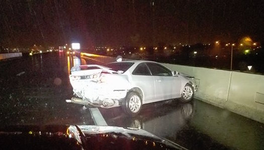 A vehicle hydroplaned Tuesday night on I-580 causing a spinout crash with injury to the motorist. Photo by Crystal Pacheco