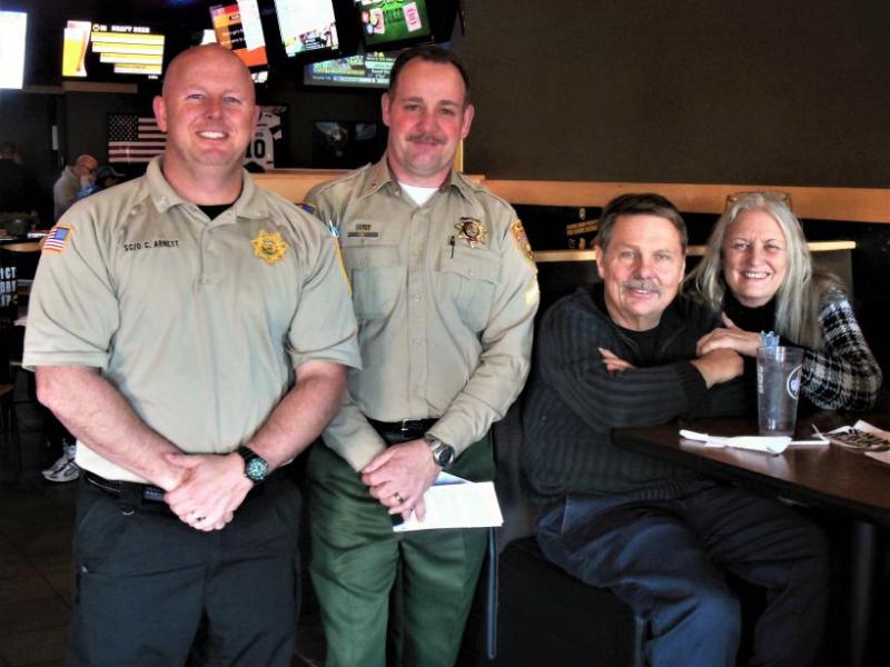 Photos by Brett Fisher. Nevada Dept. of Corrections officers with customers at Buffalo Wild Wings.