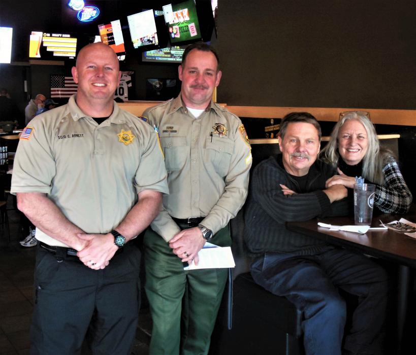Photos by Brett Fisher. Nevada Dept. of Corrections officers with customers at Buffalo Wild Wings.