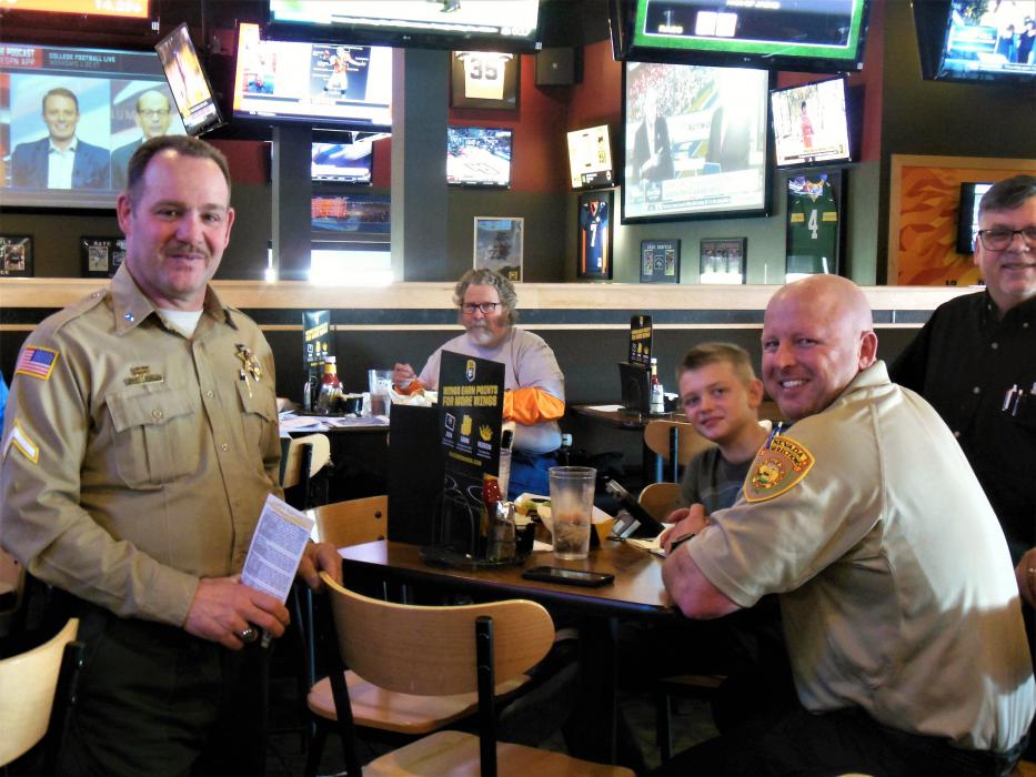 Nevada Dept. of Corrections officers serving at Buffalo Wild Wings.