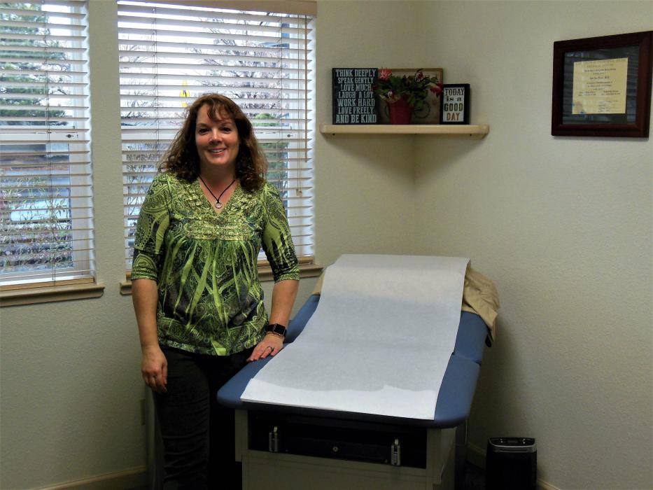 Dr. Julie Foster in her practice's medical exam room.
