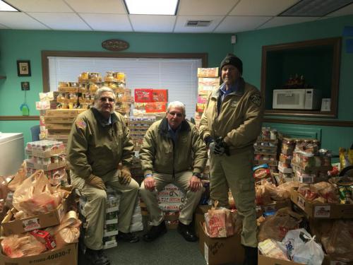 VIPs Al Bergstrom, Curtis Spencer, Bob Shulman shown with thousands of dollars worth of donations to the Dayton Food Pantry.