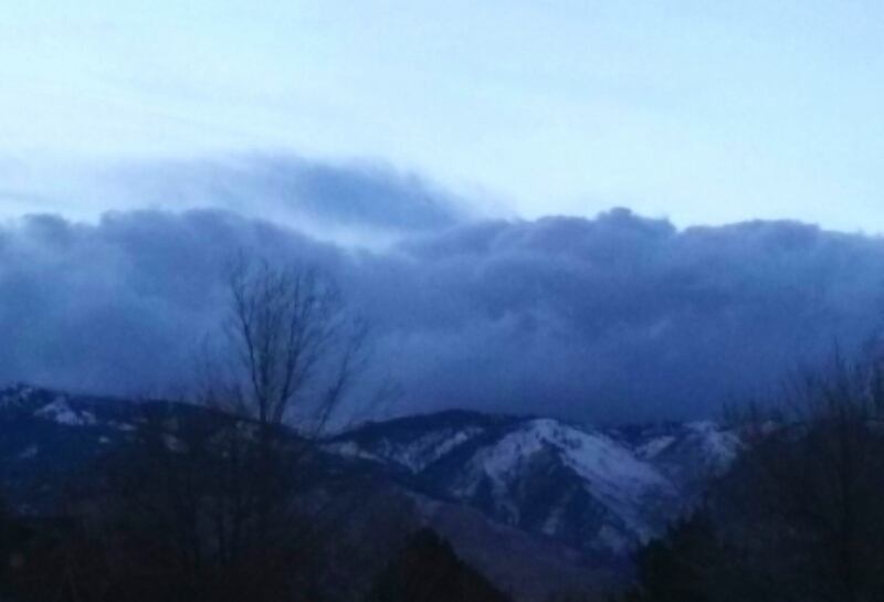 Photo by Brett Fisher. A storm moves east over the Sierra Nevada toward Carson City.