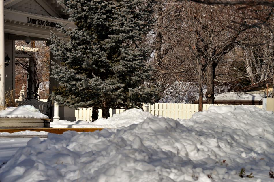 Snow piled up on the center median in the driveway of the Governor's Mansion.