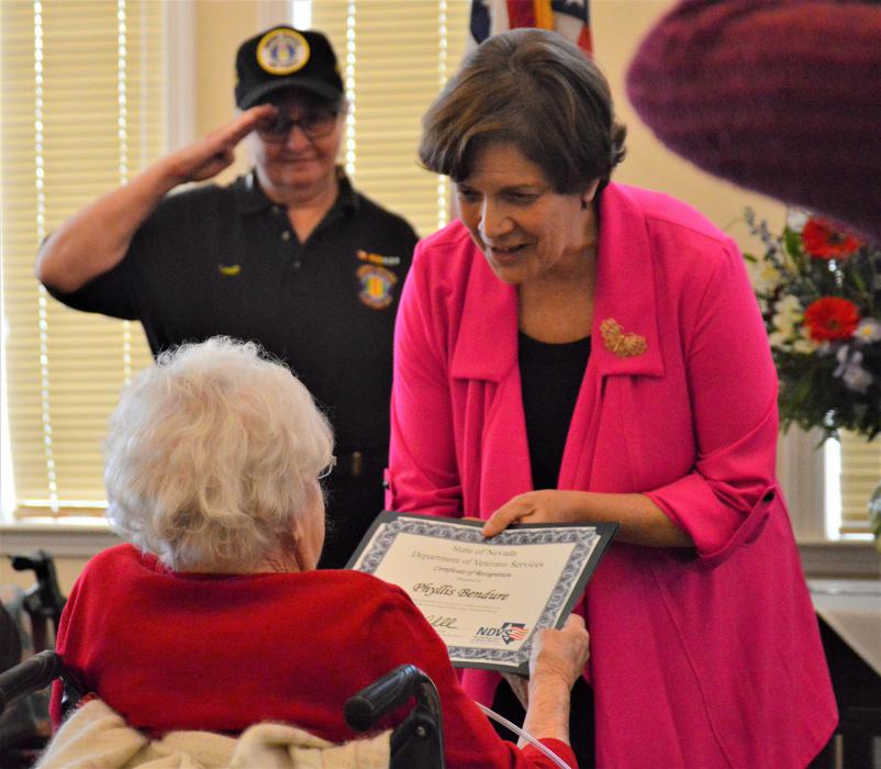 NVDS Director Katherine Miller presents a certificate to Phyllis Bendure Wednesday.