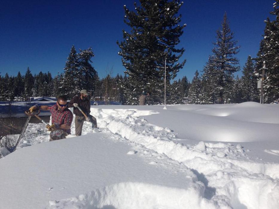 City of South Lake Tahoe building department staff help clear roofs from massive snow storms.