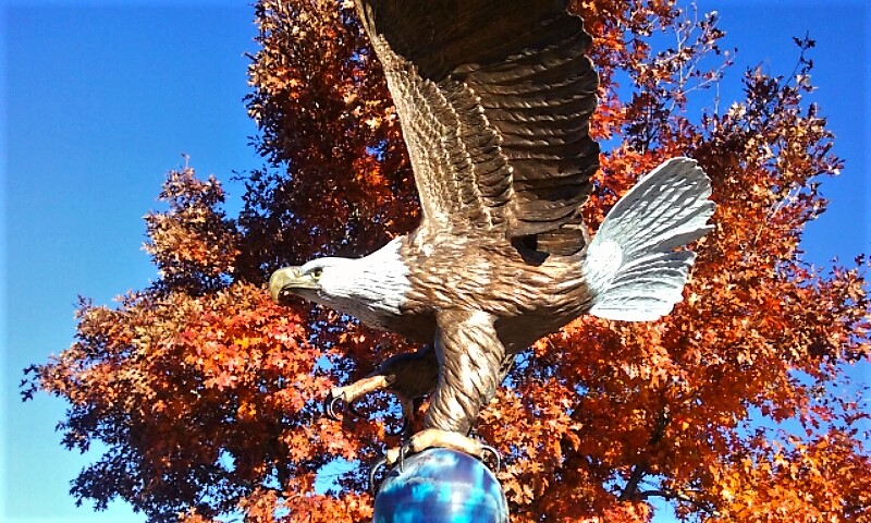 Bronze eagle atop the Korean War Veterans Memorial at the end of E. Fifth Street.