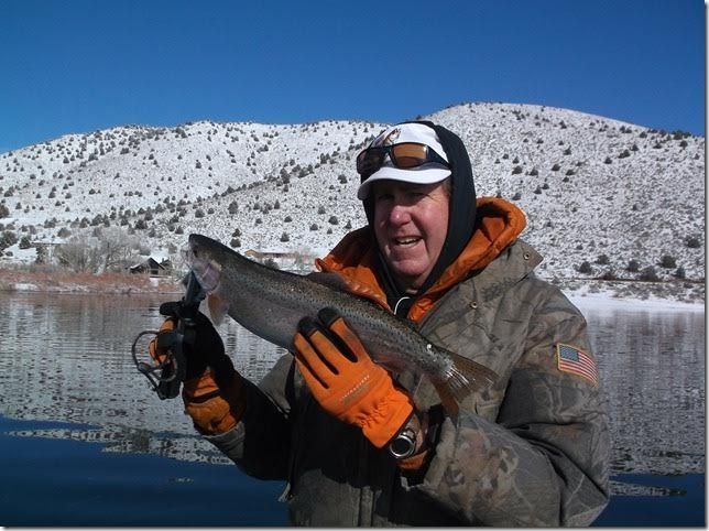Tom Blotter of Minden with one of his many 2.5 pound rainbows caught at Topaz Lake this week.