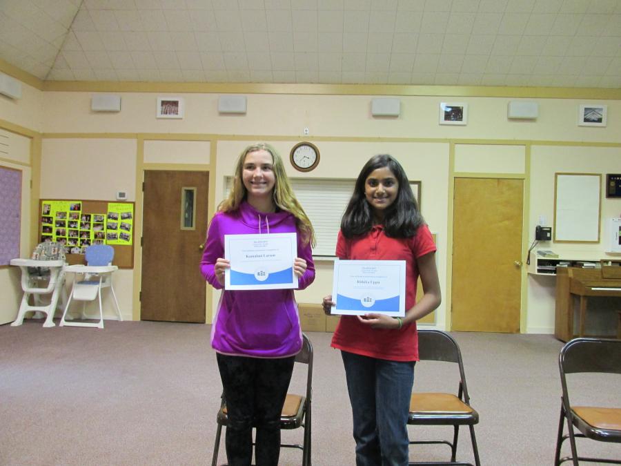 7th Grade Bee: City Champion, Kamalani Larson from St. Teresa with Rithika Uppu from Bethlehem Lutheran School