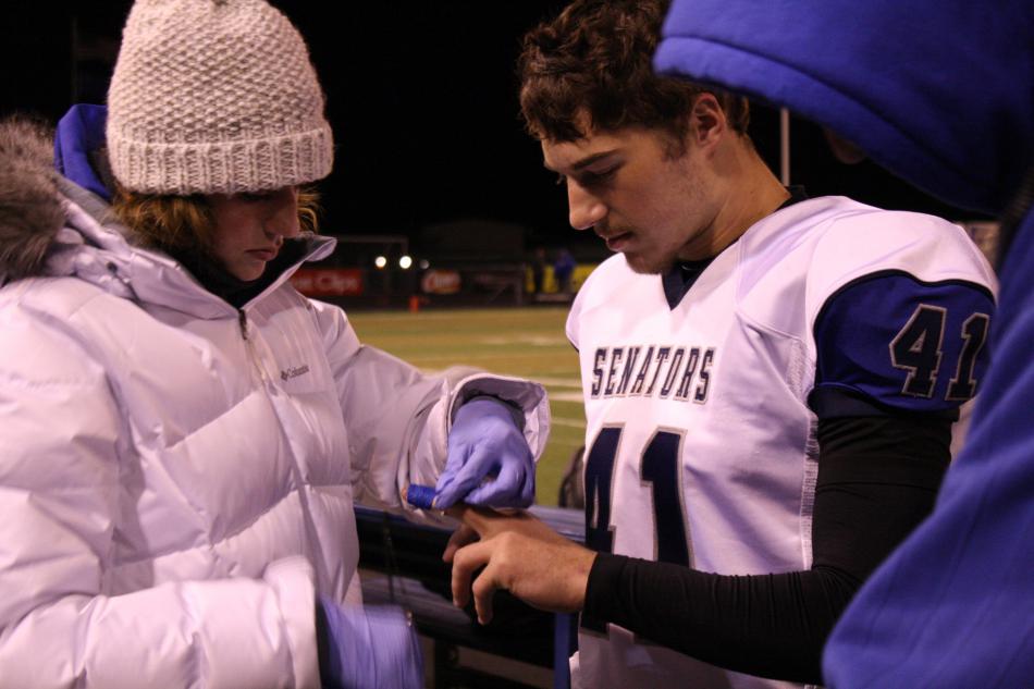 Former Carson High School CTE student Caroline Gabica practices skills learned in sports medicine.