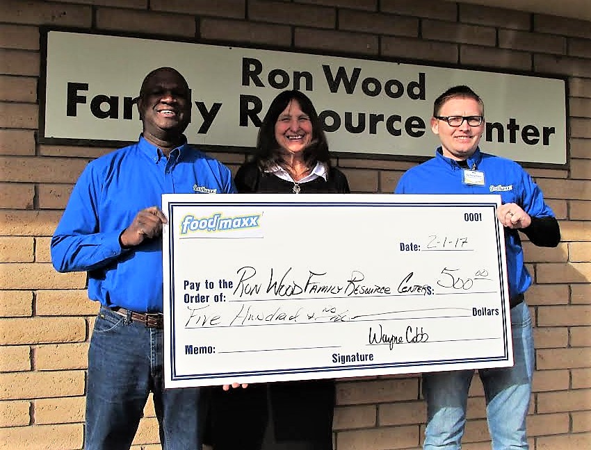 FoodMaxx's Wayne Cobb and Zachary Davis with Joyce Buckingham (center).