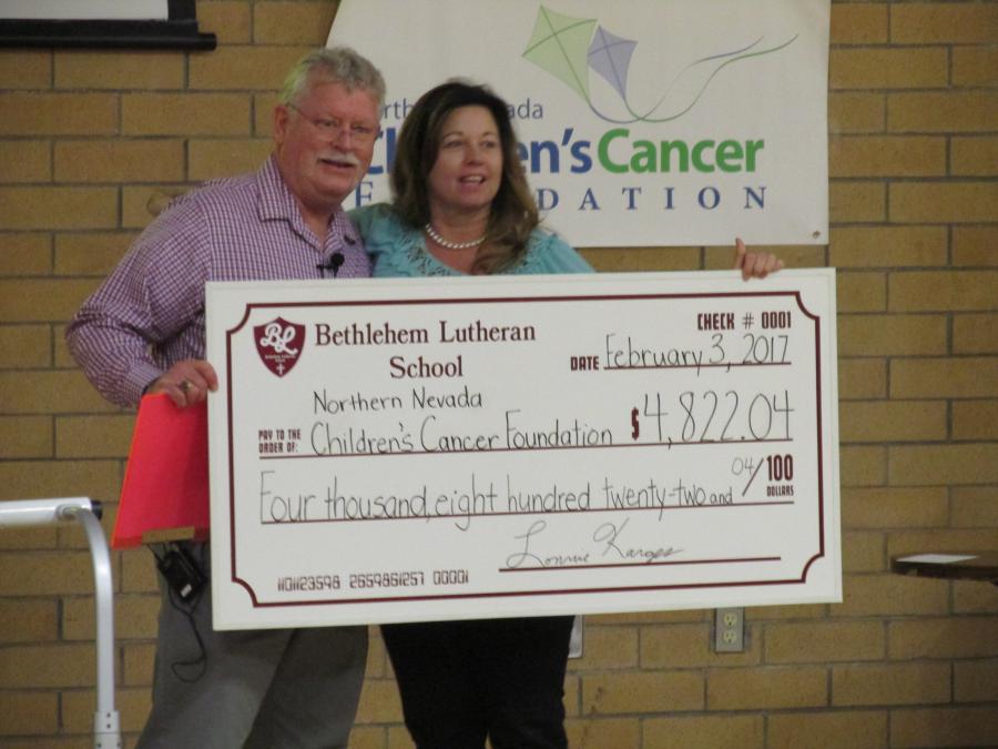 School Principal, Lonnie Karges and Lisa Schaffer from the Children's Cancer Foundation