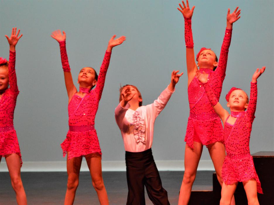 Youth dancers perform Saturday at the end of the Miss Carson City pageant.