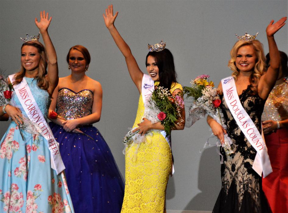 2017 titleholders Carli Gumm, Macie Tuell and Briana Neben wave Saturday on stage in the Bob Boldrick Theater.