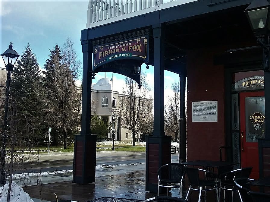 The Legislature dome visible from the veranda at The Fox Brew Pub on Bob McFadden Plaza.