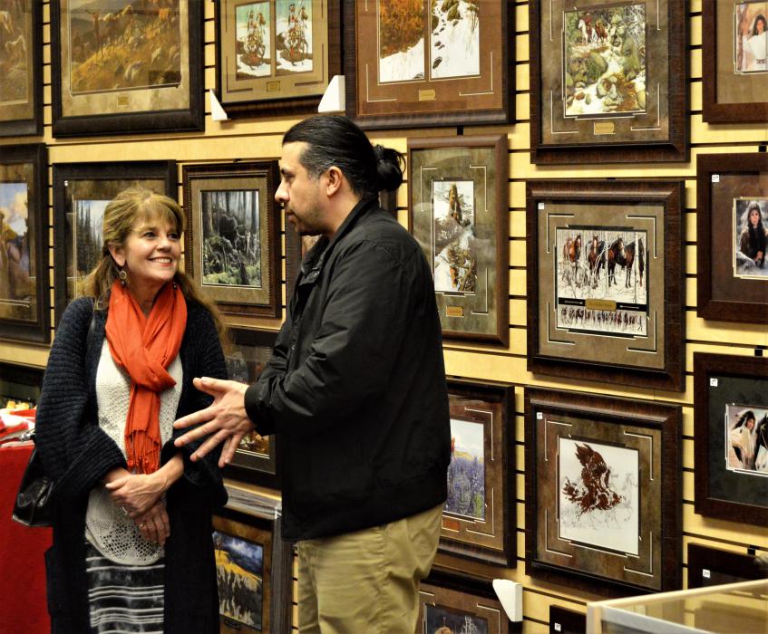 Carson City Supervisor Karen Abowd chats with Community Arts Coordinator Mark Salinas Wednesday at the Wild Horse Gallery.
