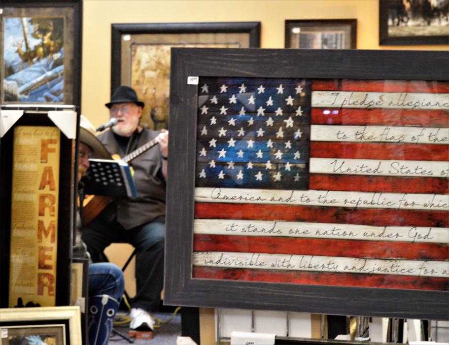 Live music was played Wednesday inside the Wild Horse Gallery for its ribbon cutting celebration.