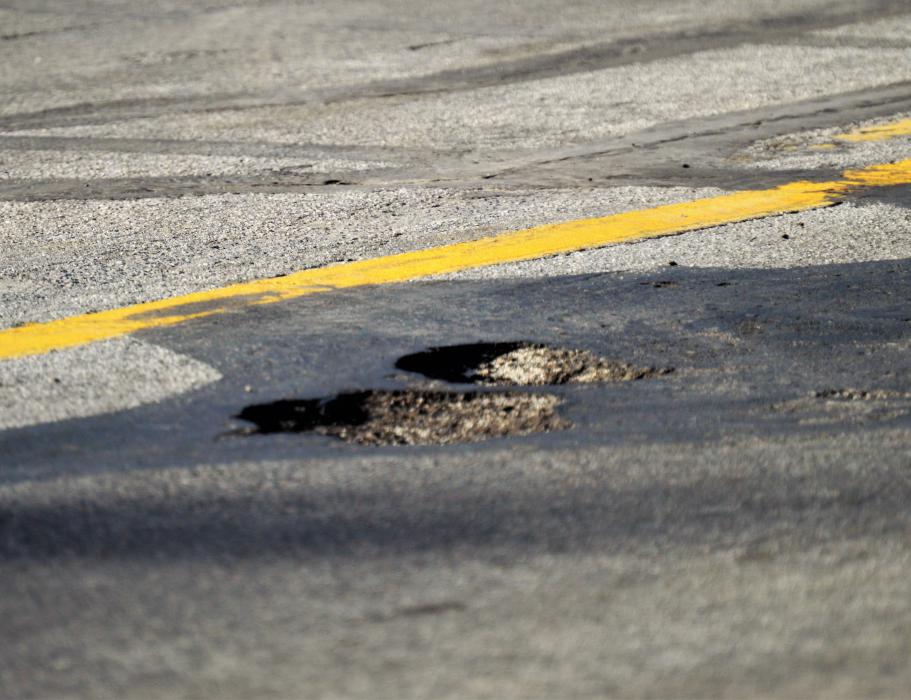 Potholes in the center of Colorado Street.