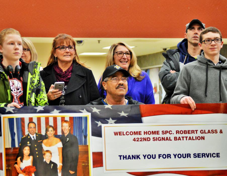 Robert Glass's family waits anxiously in the main terminal of RTIA Friday.