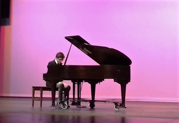 Henry Sturm on piano during the CHS Talent Show.