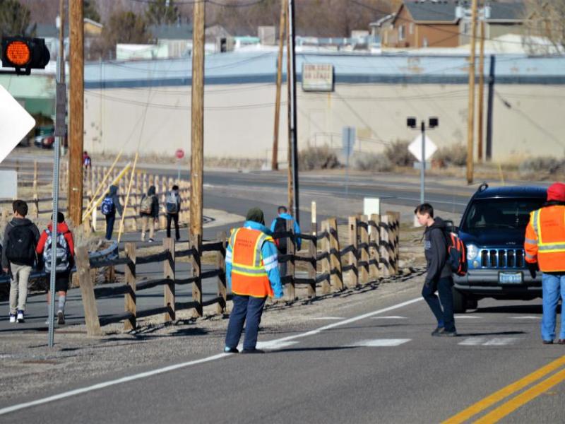 Photo by Brett Fisher. Eagle Valley Middle School students cross Fairview Drive.