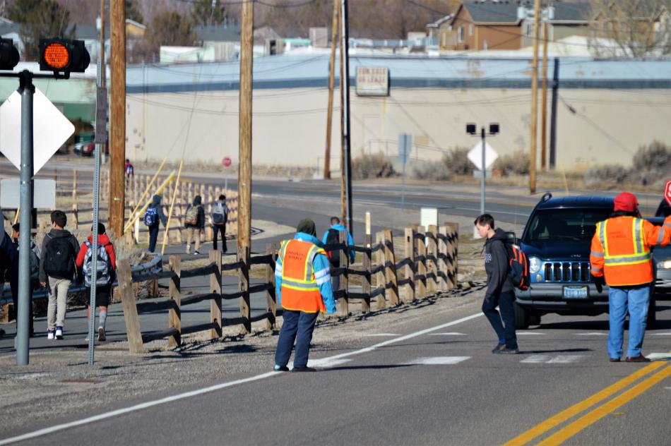 Photo by Brett Fisher. Eagle Valley Middle School students cross Fairview Drive.