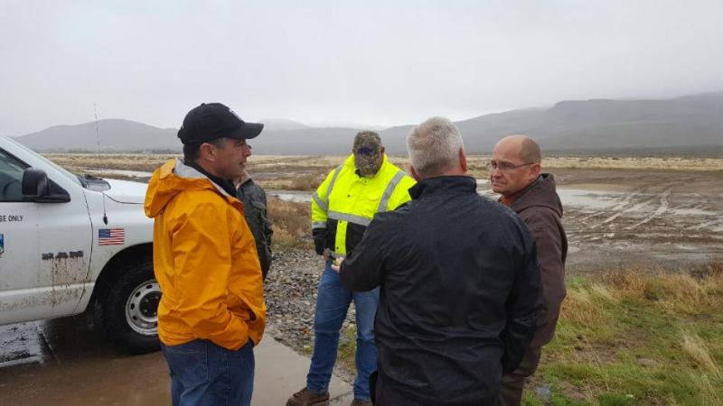 Governor Sandoval, Commissioner Ken Gray, Lyon County Manager Jeff Page, and State Water Engineer Jason King.