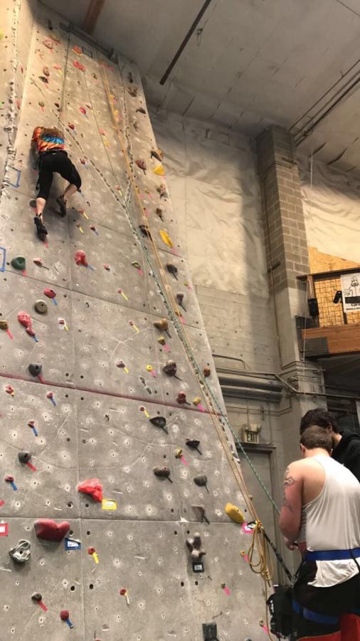 Kayla Climbs with Skyler Motivating Below