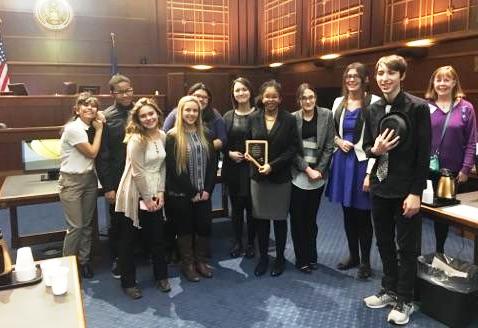 CHS Mock Trial team with chemistry and geoscience teacher Sara Davis and trial organizer Kathleen Dickinson.