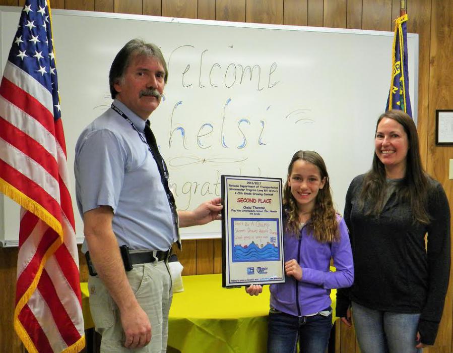 Chelsi Thornton with her award in Elko.