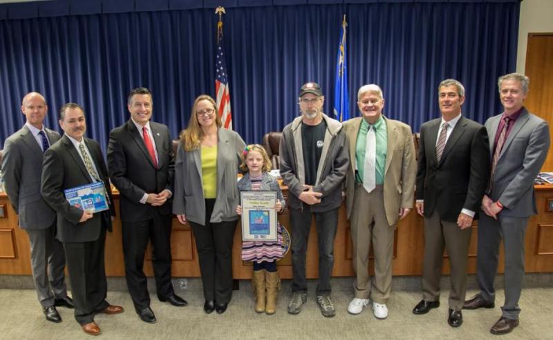 Photos courtesy NDOT. Ruby Warren of Carson City with her award at the Transportation Board Meeting.