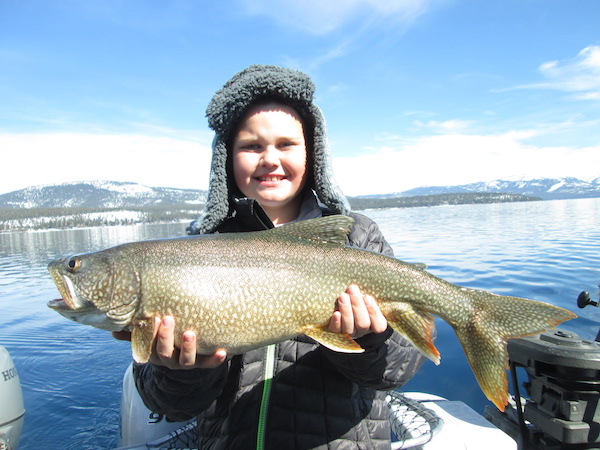 Lake Tahoe catches: Thomas Pohrme, 9, from Dallas, second pic, Brian Guthrie of Wash.  Photos by Gene St Denis
