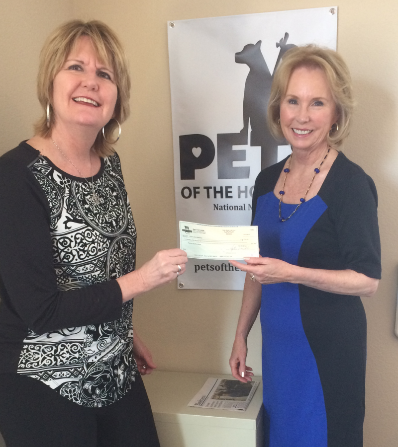 Presenting check to Pets of the Homeless