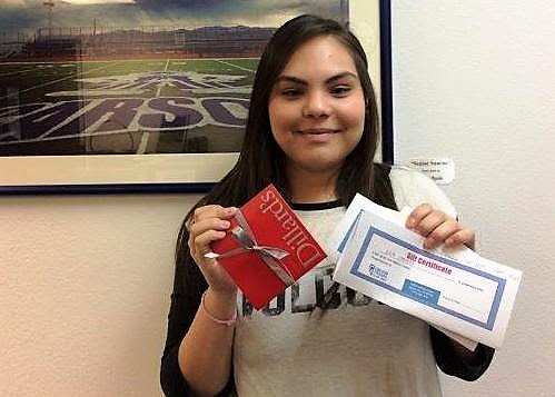 CHS senior Gizhe Cardoza with her prom package from GNCU.