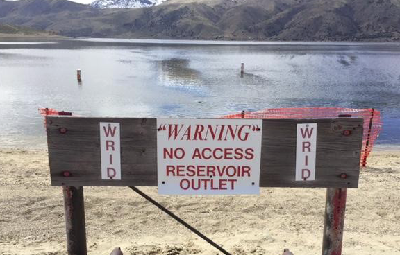 More signage will go up around Topaz Lake near the drainage area where a dog died on Saturday.