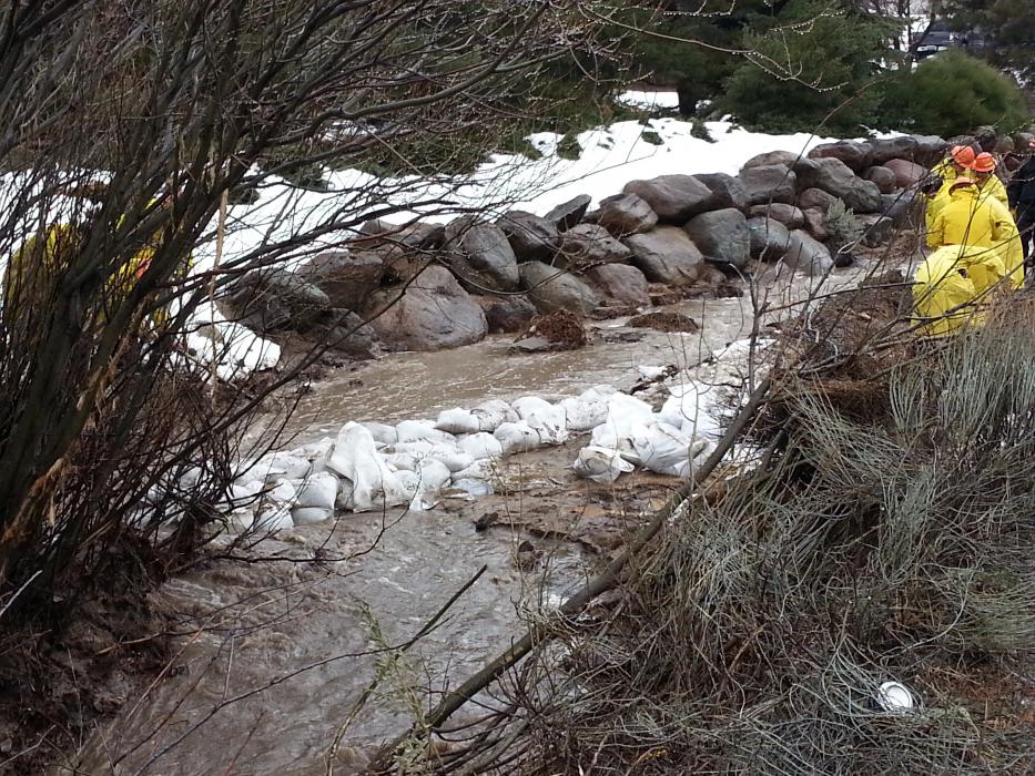 This Carson City file photo shows sand bagging measures along a stream during flooding in February of this year.