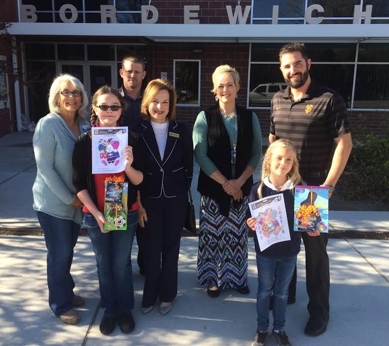 Photos courtesy CCSD. Lila Downs and Cadence Schnaible pose with their winning entries.