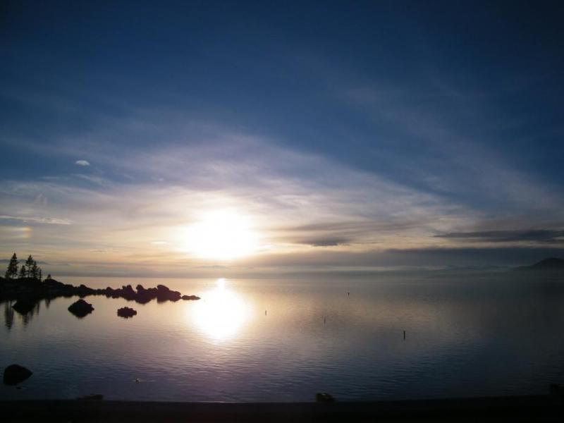 Photo by Brett Fisher. Sunset on Lake Tahoe from Sand Harbor State Park.