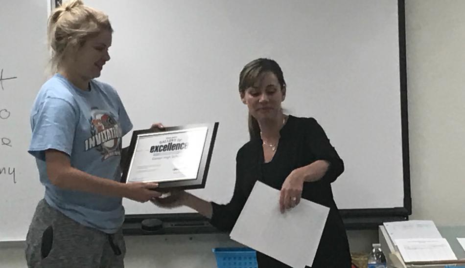 CHS senior Ariana Schmidt receiving the 2017 Gallary of Excellence award.