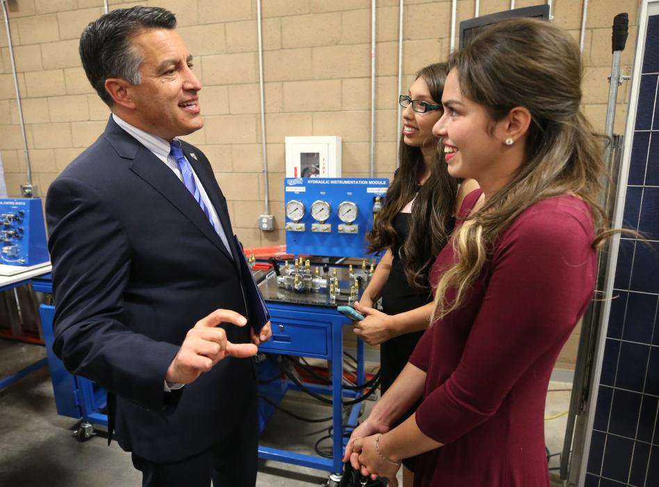 Gov. Sandoval with Diana Gurrola, outgoing ASWN president and incoming president Tania Covarrubias. Nevada Photo Source
