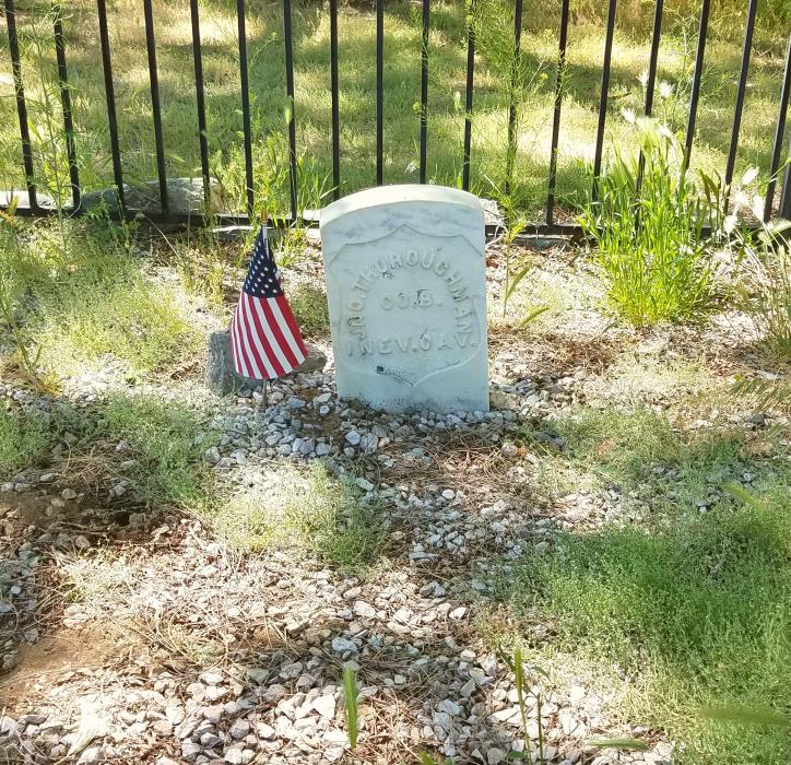 Grave of Nevada veteran John Thoroughman behind Fuji Park.