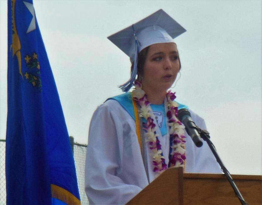 Class of 2017 valedictorian Ana Glenn delivers opening remarks Saturday.