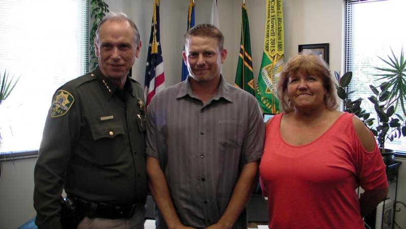 L to R: Carson City Sheriff Ken Furlong, tournament organizer Chris Sieben and DARE Officer Lisa Davis.