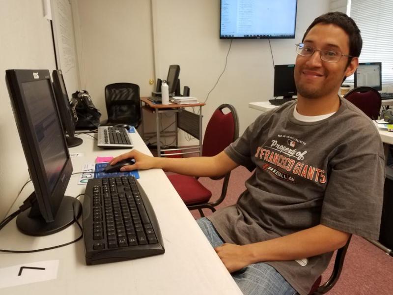 Photos courtesy PITA. Arnie Zeledon studies Advanced Microsoft Word.