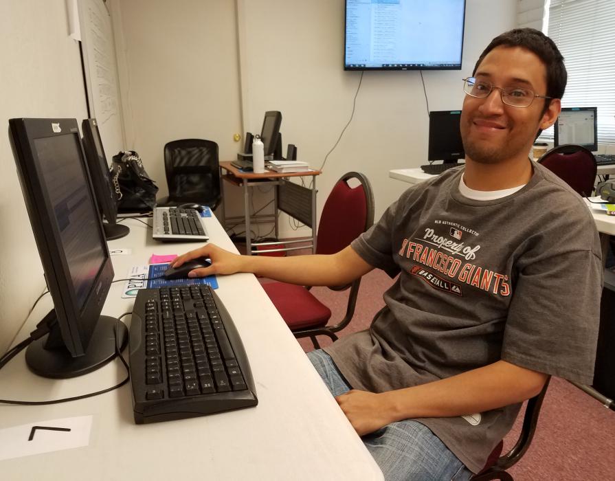 Photos courtesy PITA. Arnie Zeledon studies Advanced Microsoft Word.